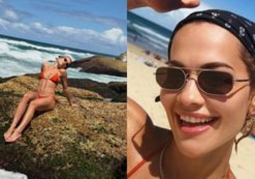 Muśnięta słońcem Rita Ora wygrzewa się w bikini na australijskiej skale (FOTO)