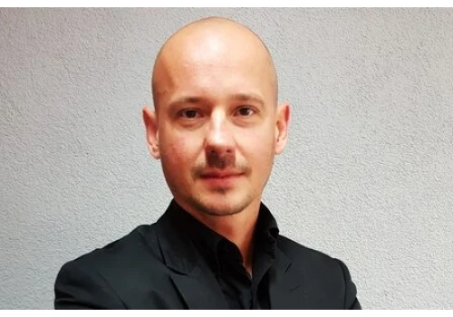 Łukasz Chęć w AvePoint