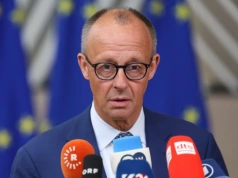 18-latek ścigany za transparent z hasłem skierowanym do kanclerza Niemiec