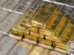 Złoto, srebro i złoty w potrzasku drożejącej ropy naftowej