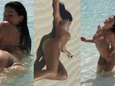 Kylie Jenner w skąpym bikini pręży podrasowane chirurgicznie wdzięki na plaży, tarzając się po piasku (ZDJĘCIA)